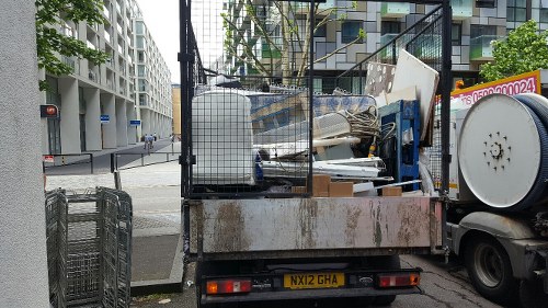 Workers loading a van for office removal in Millbank